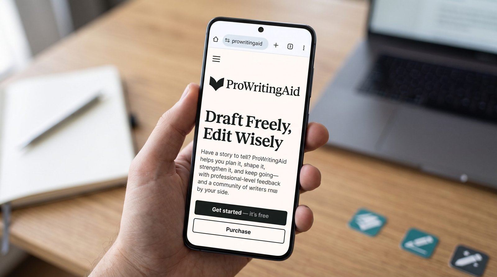 ProWritingAid review: hand holding a smartphone showing the ProWritingAid page Draft Freely, Edit Wisely